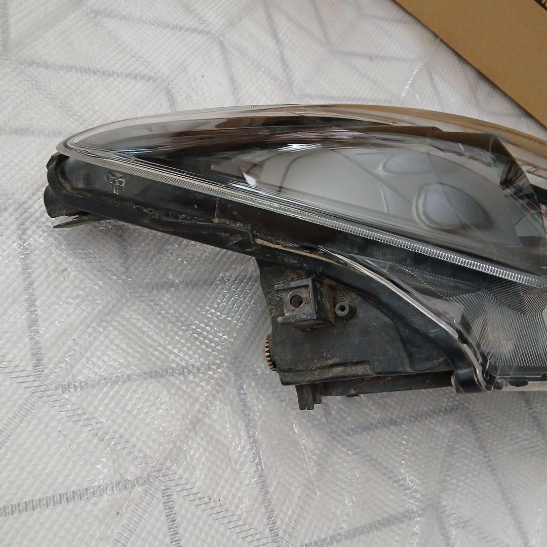 トヨタ　カローラフィルダー　運転席側ヘッドライト中古KOITO12-657