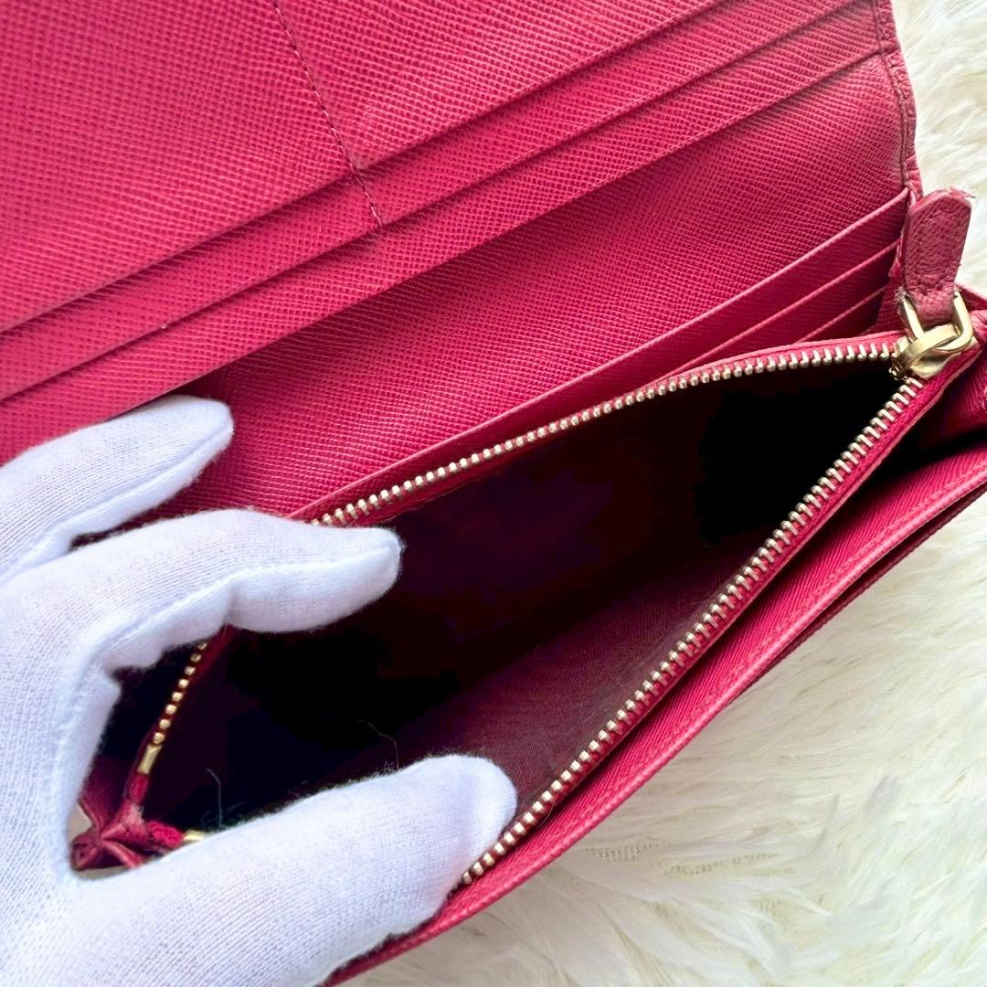 美品✨プラダ 長財布 サフィアーノ フィオッコ ピンク メタルロゴ リボン