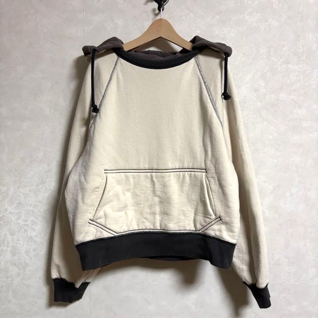 トップス FUMIKA_UCHIDA 2-TONE PULLOVER HOODIE