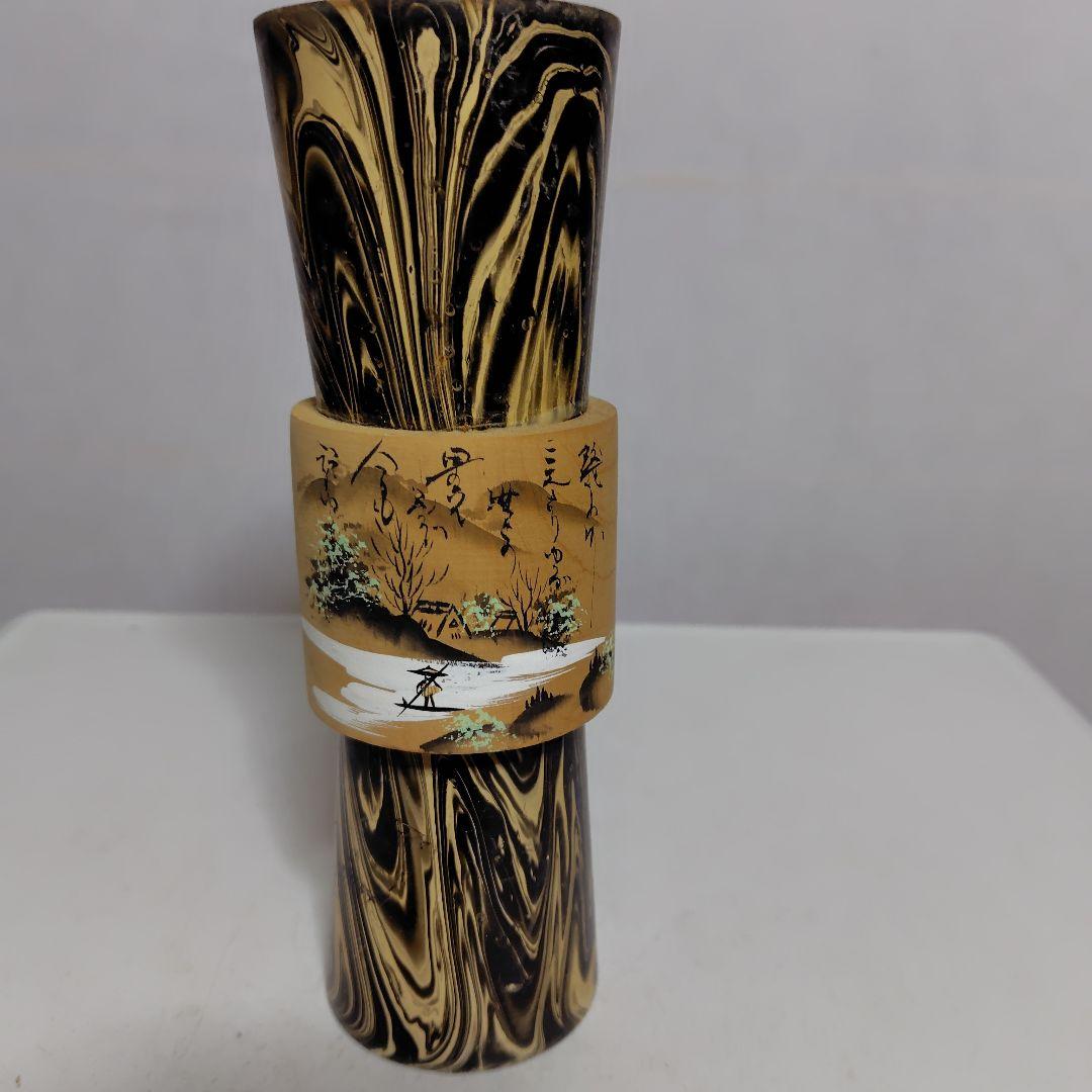 顔が優しい小芥子です。身体の帯が歴史です。