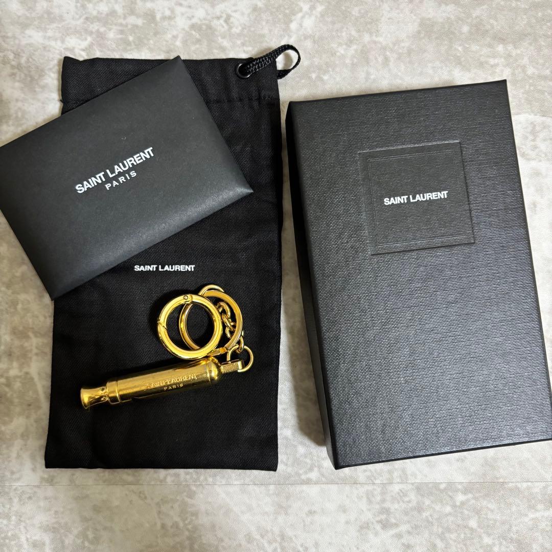 H154 良品✨サンローランパリ　キーホルダー　メタルホイッスル　笛　男女兼用