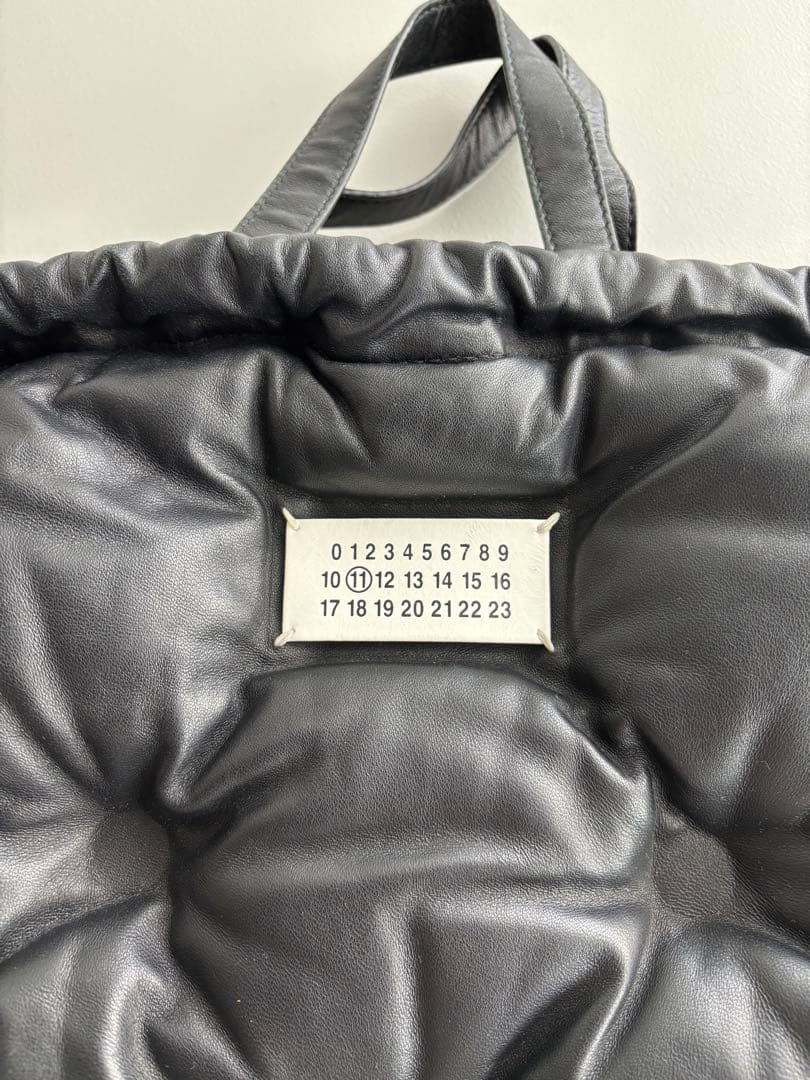 MAISON MARGIELAキルティング ドローストリングバッグ