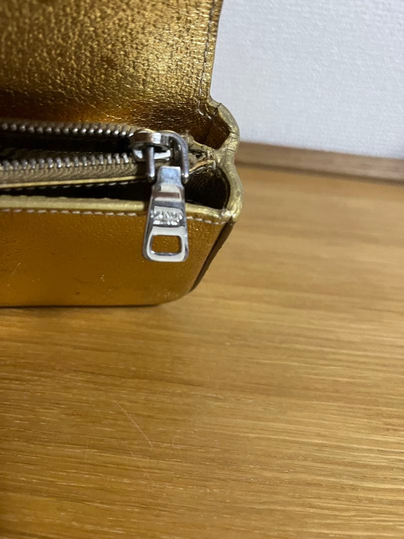 PRADA ゴールド クラッチバッグミニ