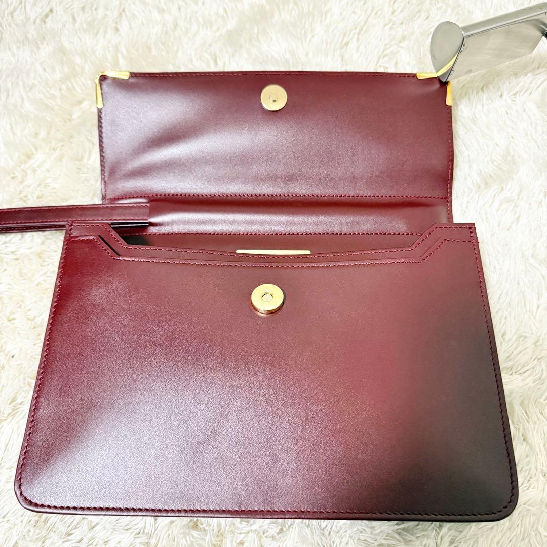 カルティエ　Cariter　マストライン　クラッチバッグ　ボルドー　ロゴ金具