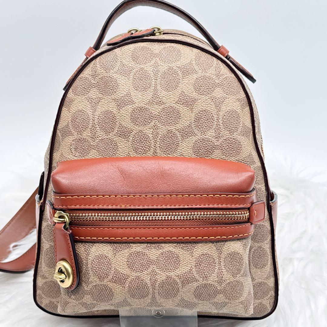 美品✨ COACH PVC レザー ターンロック シグネチャーミニリュック