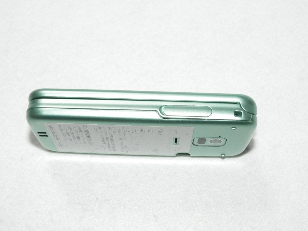富士通 らくらくホン F-02J グリーン docomo ガラホ 4G LTE